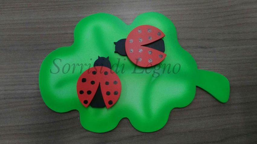 foglia-in-legno-con-coccinelle